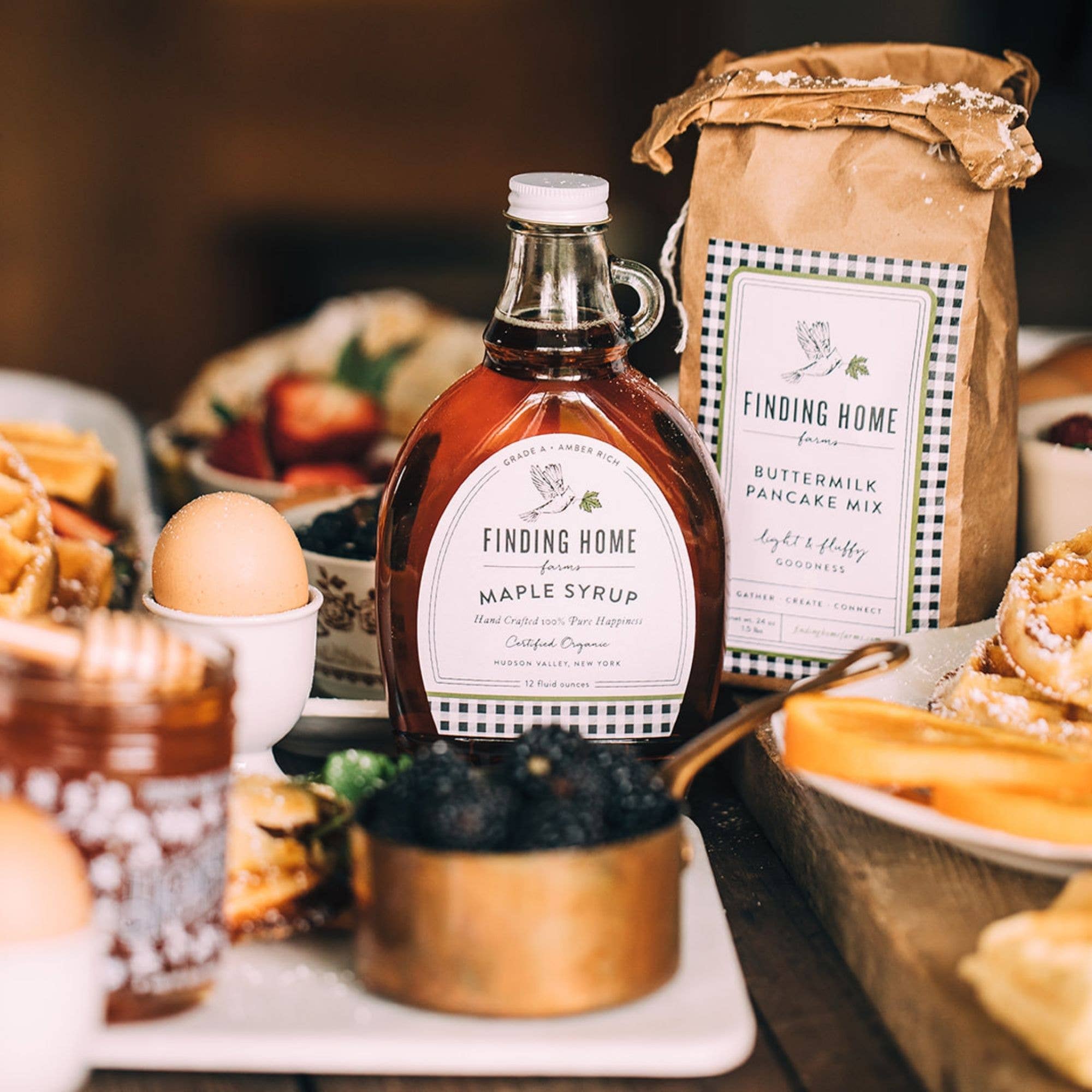 View of Buttermilk Pancake Mix by Finding Home Farms – a pancake and waffle mix paired with Finding Home’s maple syrup, set at the breakfast table