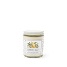 A Citrus & Salt Soy Candle in a clear glass jar by Finding Home Farms