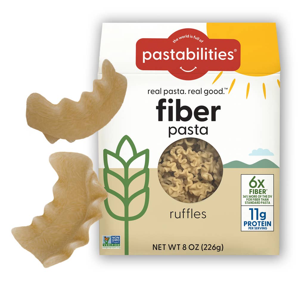 Pastabilities fiber pasta ruffles packaging with pasta pieces on a white background