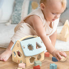 Baby playing with the House Shape Sorter by Speed Monkey - Wooden Shape Sorter Toy