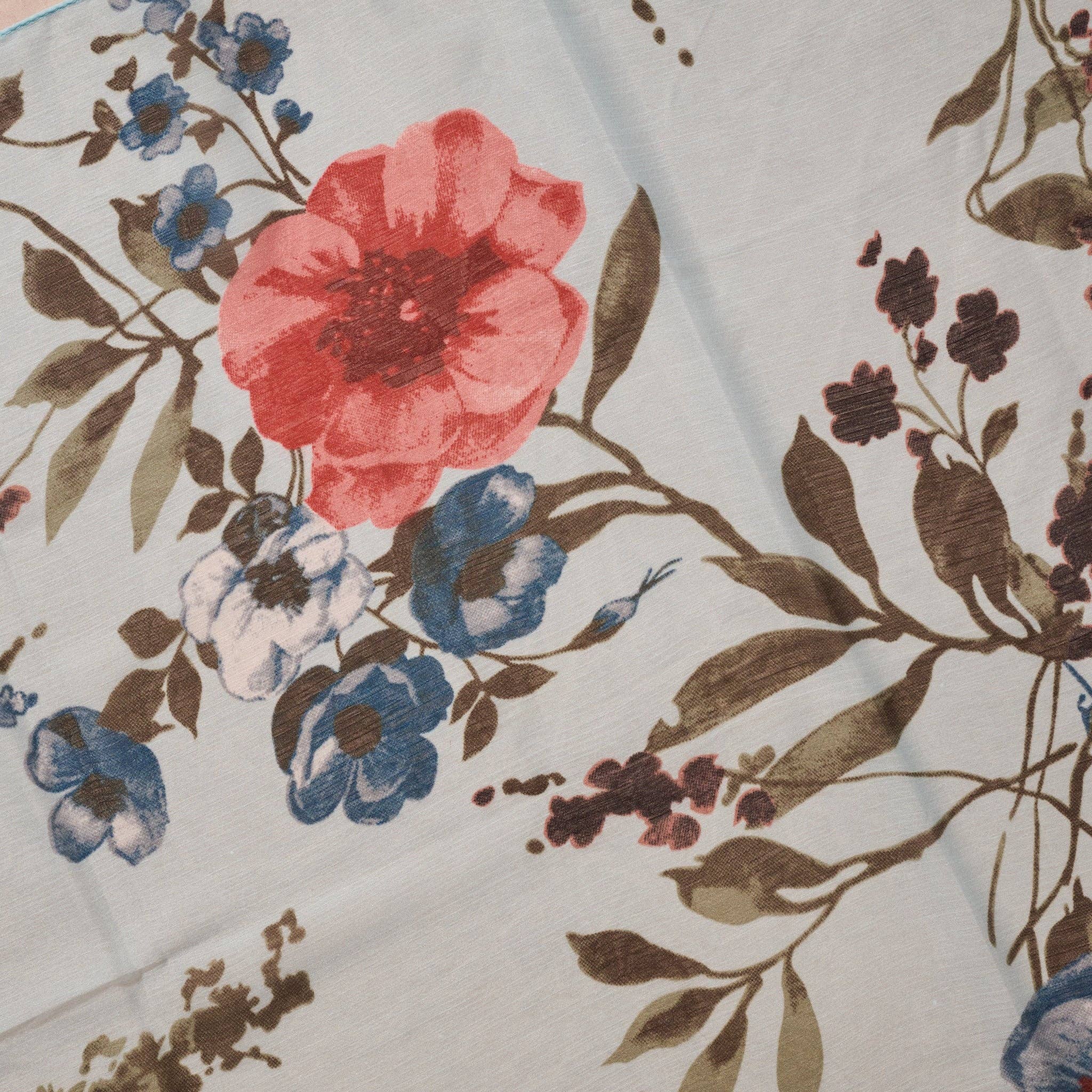 Close-up of the Komal Floral Chiffon Scarf – a lightweight chiffon scarf by Ten Thousand Villages, showcasing a delicate blue and peach floral design.