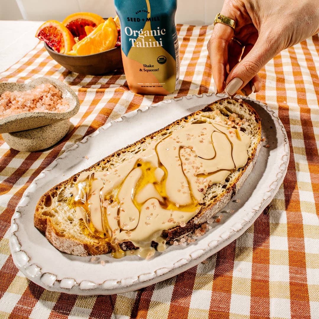 Slice of toast made with the Organic Tahini Squeeze Bottle by Seed + Mill – vegan, gluten-free