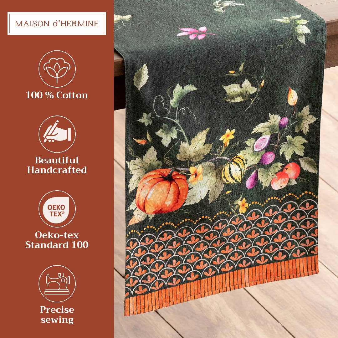 Pumpkin Garden Table Runner with a floral and fruit design on a wooden surface, featuring Maison d'Hermine branding.