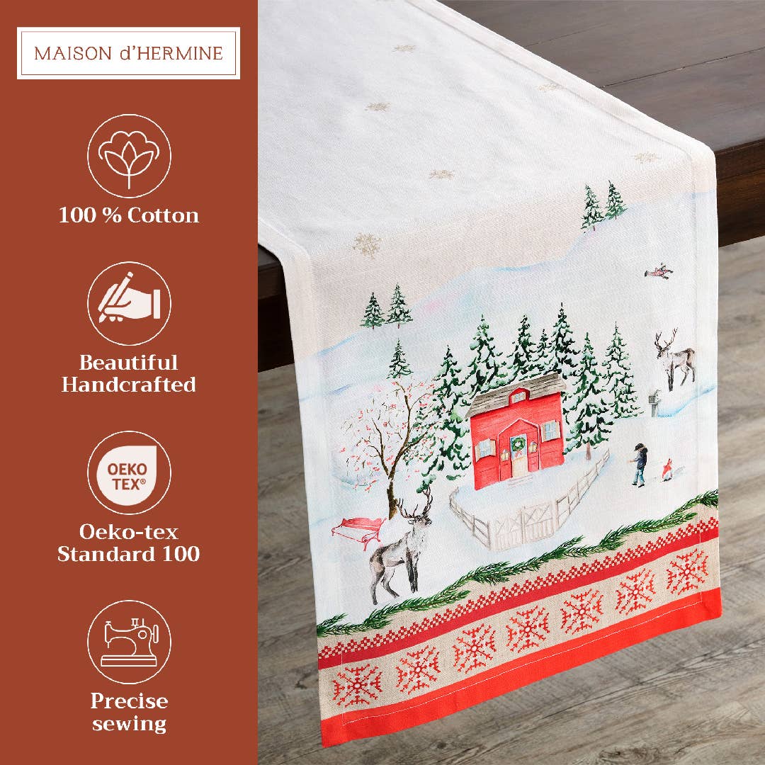 Rural Christmas Table Runner by Maison d'Hermine, showcasing a festive winter scene design on a wooden surface, complete with branding and product details.