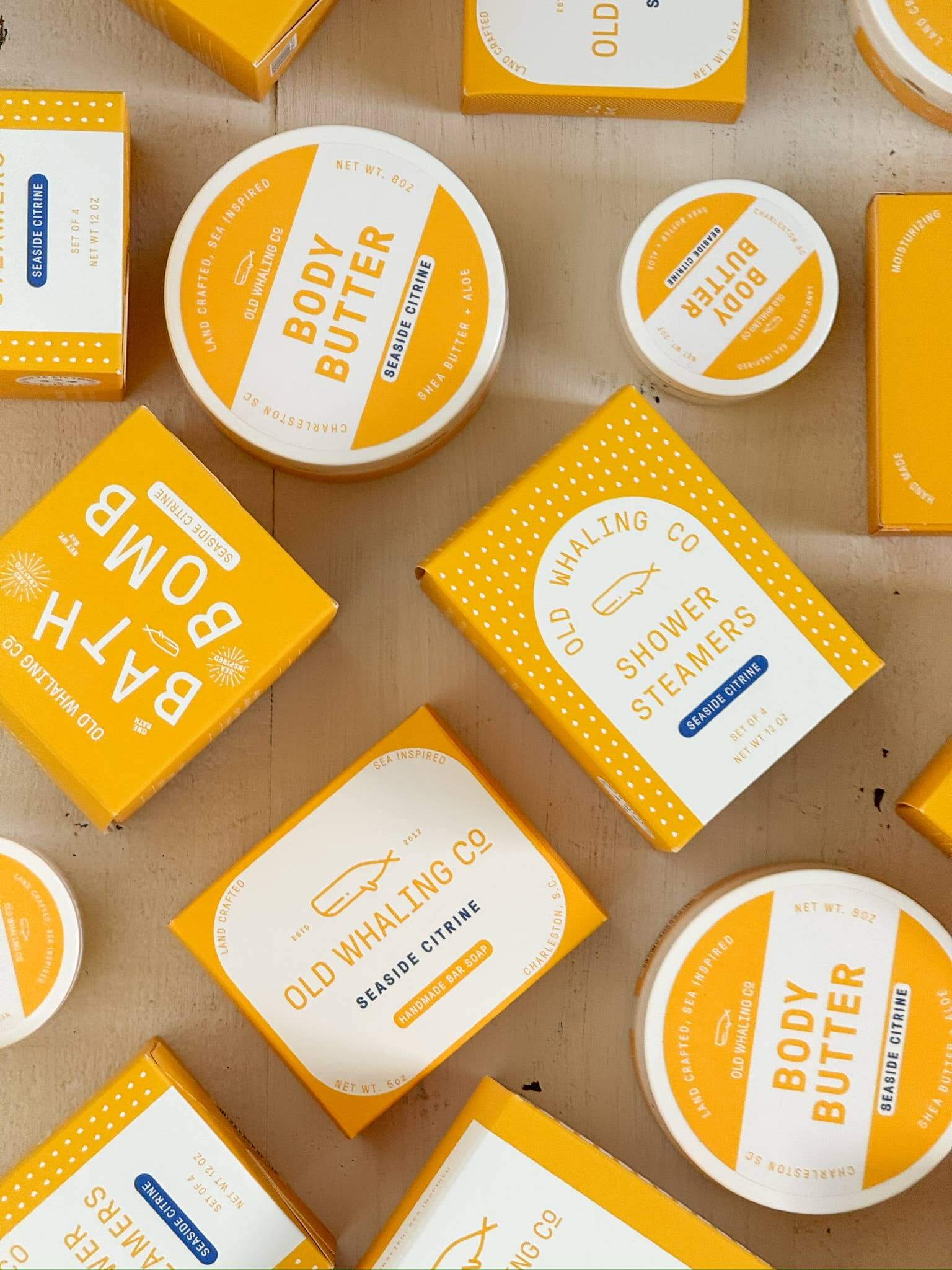 Seaside Citrine 8oz body butter by Old Whaling Co surroundeded with other Seaside Citrine products