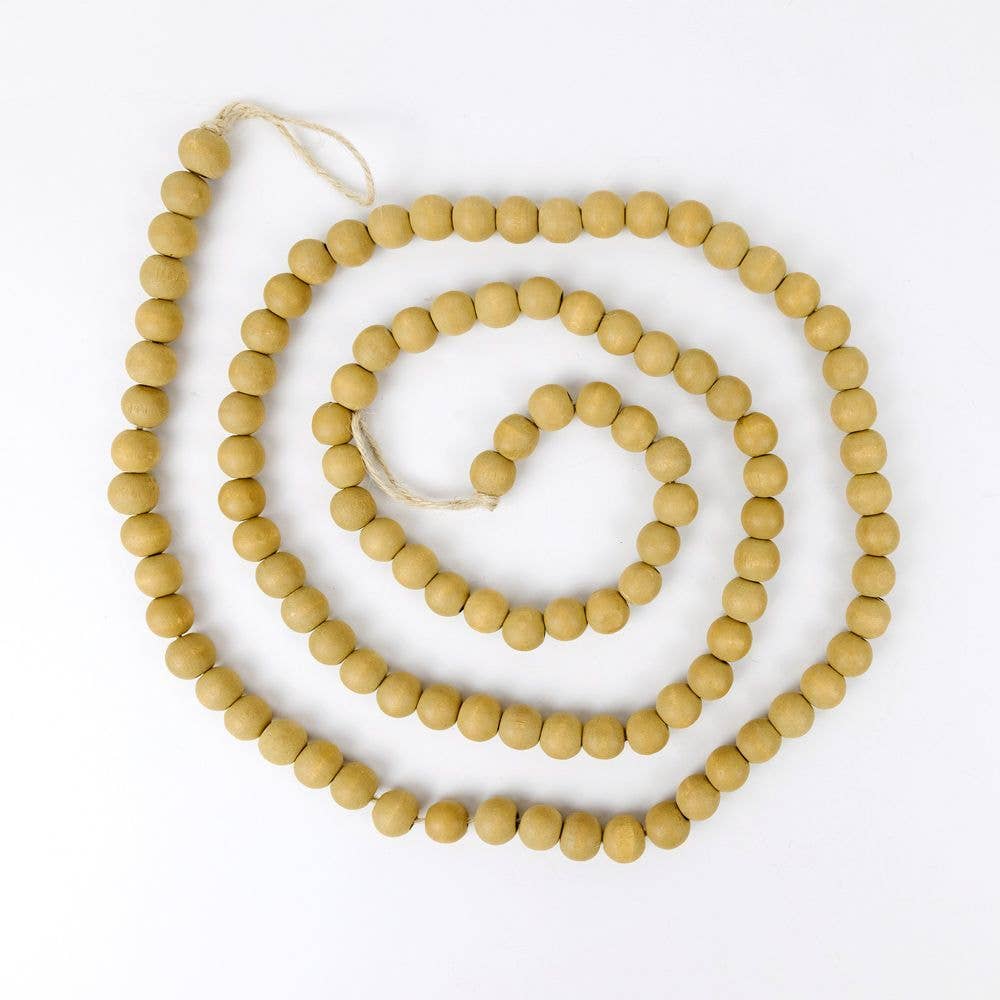 String of wooden beads on a white background