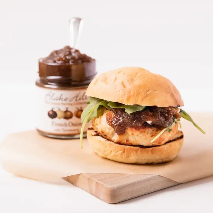 Chicken topped with Blake Hill Preserves French Onion with Rosemary jam inside a bun.