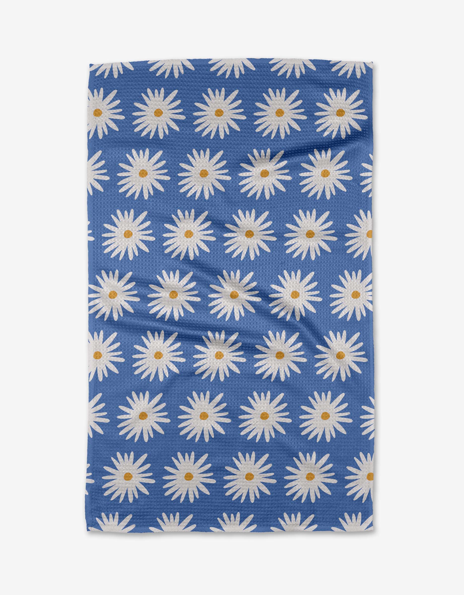 Blue Daisies Tea Towel by Geometry. Tea Towel has a white daisies on a blue background.