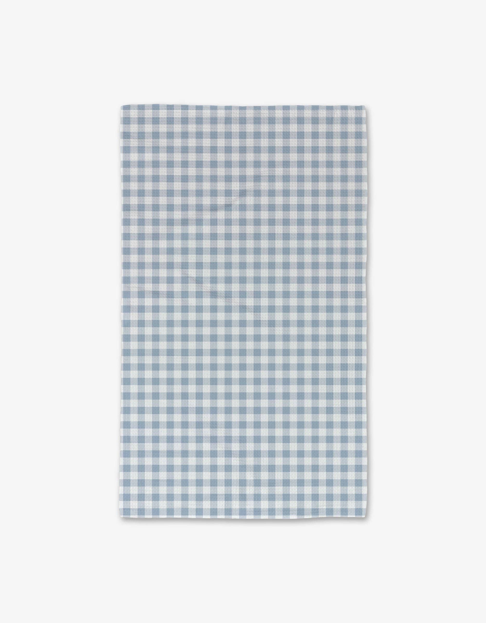 Blue Gingham Luxe Hand Towel by Geometry. Hand Towel has a blue and white gingham pattern background.