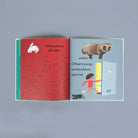 Interior spread of “Everyone Poops” explaining bathroom habits