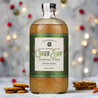 Ginger Snap Cocktail Mixer bottle surrounded by ginger snap cookies