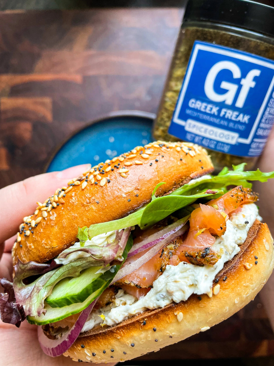 Bagel sandwich seasoned with Greek Freak Mediterranean Rub by Spiceology – a Greek-inspired spice blend