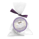Lavender Fields natural bath bomb with shea butter in a clear plastic bag tied with a matching color bow