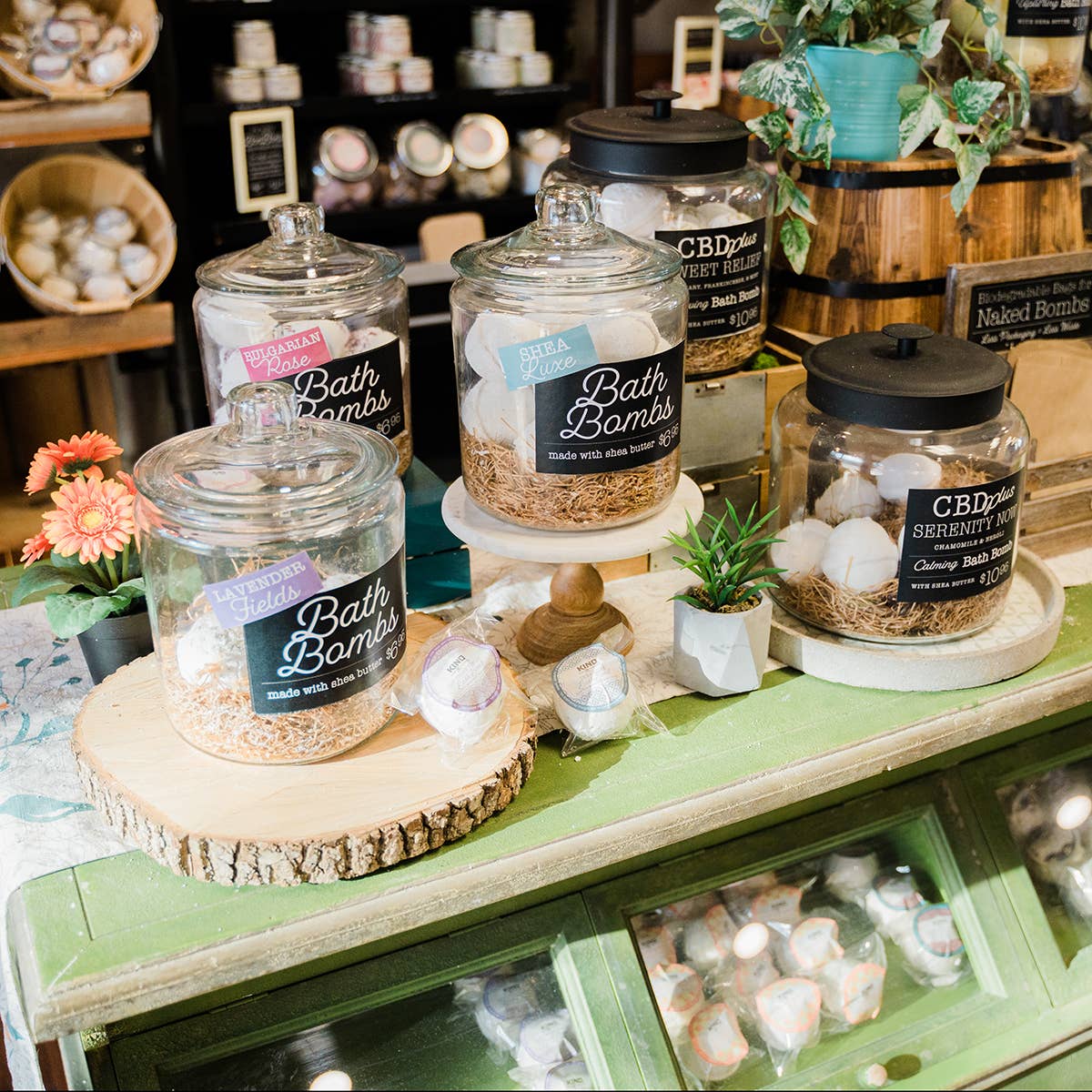Natural bath bombs displayed on retail shelf