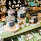 Natural bath bombs displayed on retail shelf