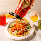 Tacos drizzled with the Organic Spicy Tahini Squeeze Bottle by Seed + Mill – vegan, gluten-free
