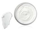 Inside view of Seaside Citrine 2oz travel size body butter by Old Whaling Co in a plastic jar.