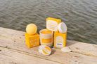 Seaside Citrine 2oz travel size body butter by Old Whaling Co surrounded with other Seaside Citrine products