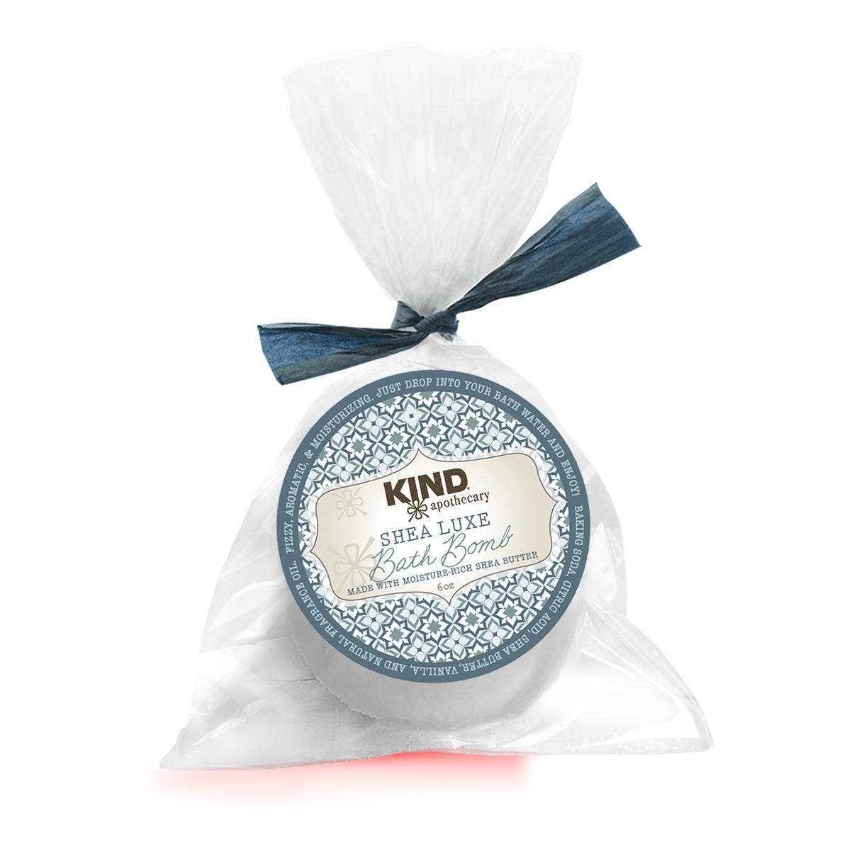 Shea Luxe  natural bath bomb with shea butter in in a clear plastic bag tied with a matching color bow
