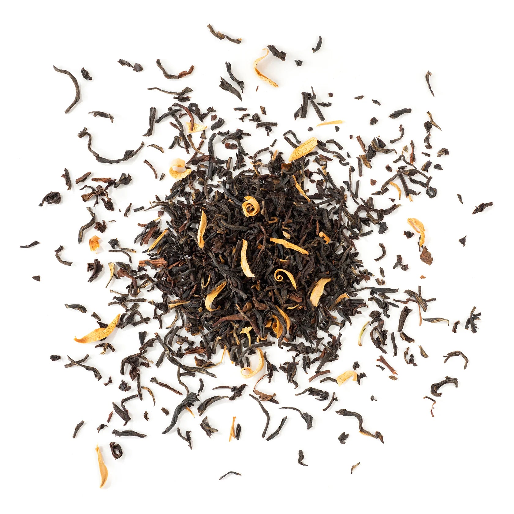 Sweet Cream Early Grey tea leaves from Apolis Tea with orange pieces on a white background
