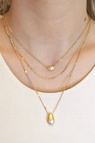 Asher Necklace Set by My Girl In LA. The set includes 3 satin gold necklaces that can be worn individually or all together.