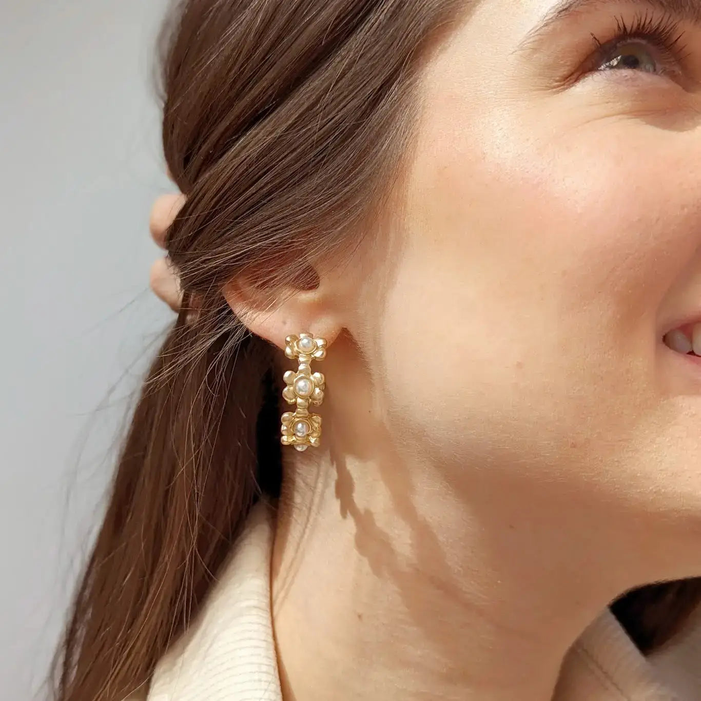 Jesse Earrings by My Girl In LA are hoop style in a matte gold finish. Earrings are also Sensitive Skin Friendly.