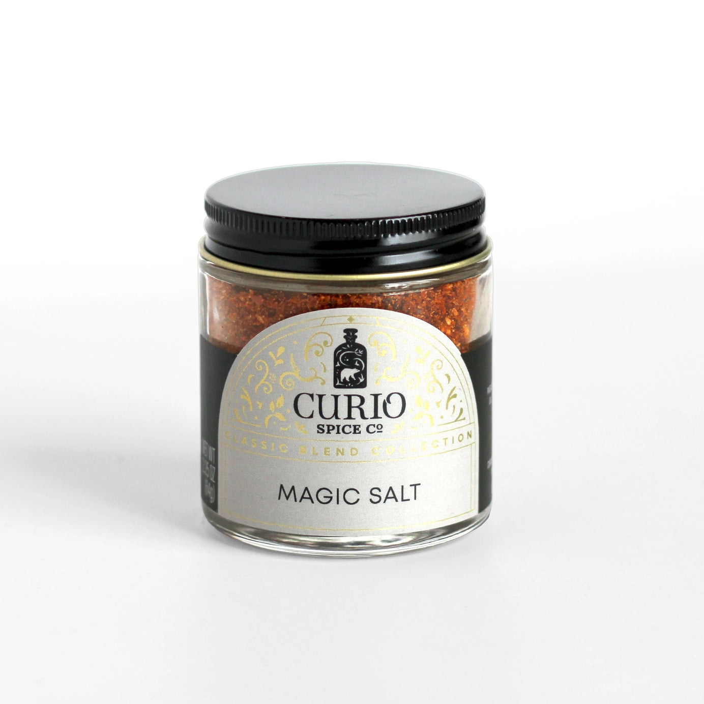 Curio Spice Co Magic Salt in a glass jar.