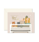 Spoiling Baby Greeting Card with coordinating envelope by Ginger P. Designs. Card front has a crib filled with presents and saying let the spoiling begin yay!