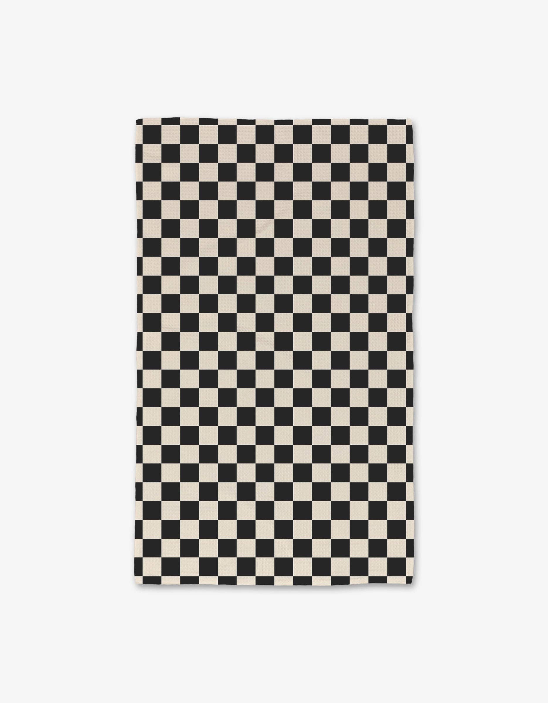 Checkered Luxe Hand Towel by Geometry. Hand Towel has a black and white checkered pattern