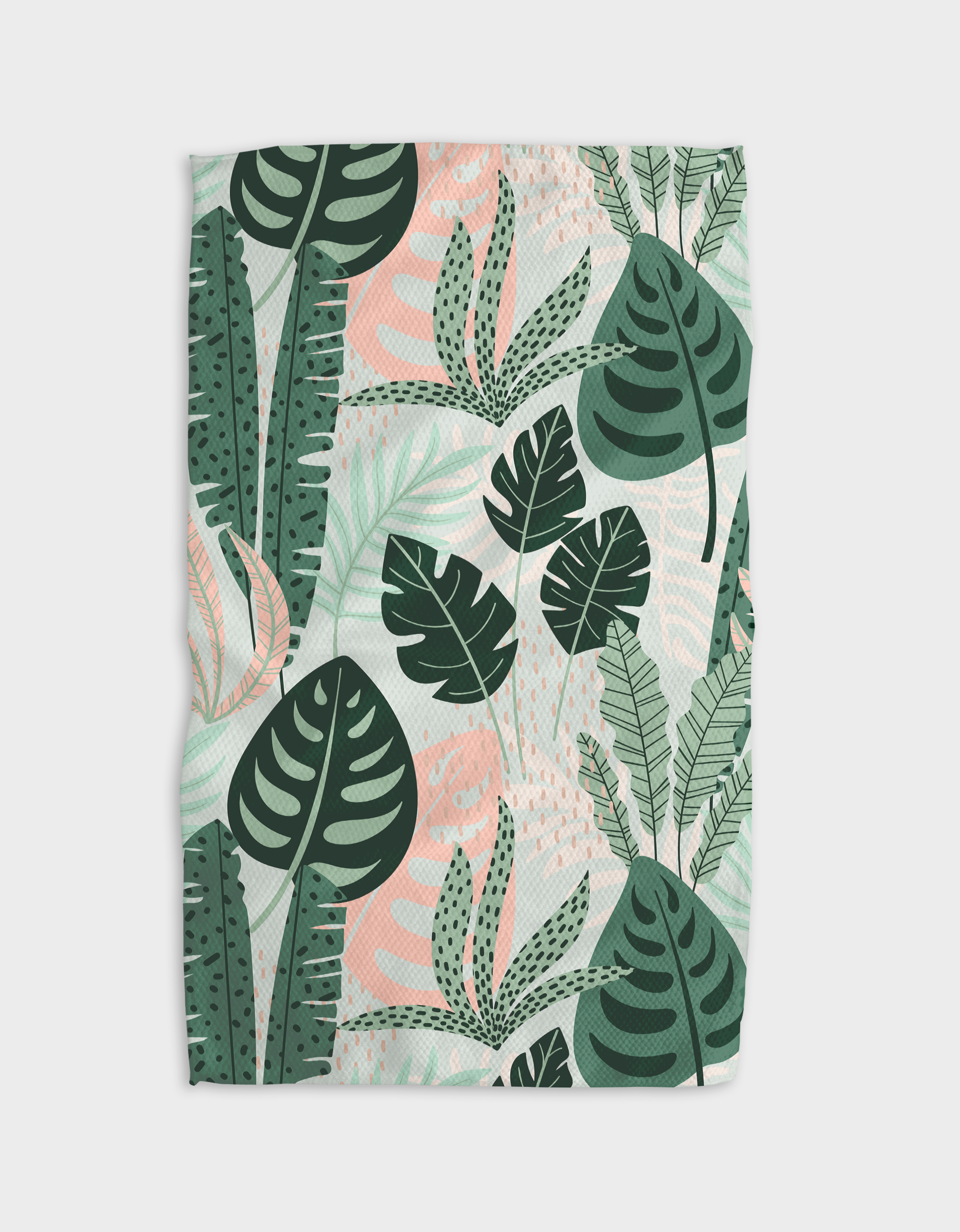 Diedre Tea Towel by Geometry. Tea Towel has variuos leafs in pink and green shades.
