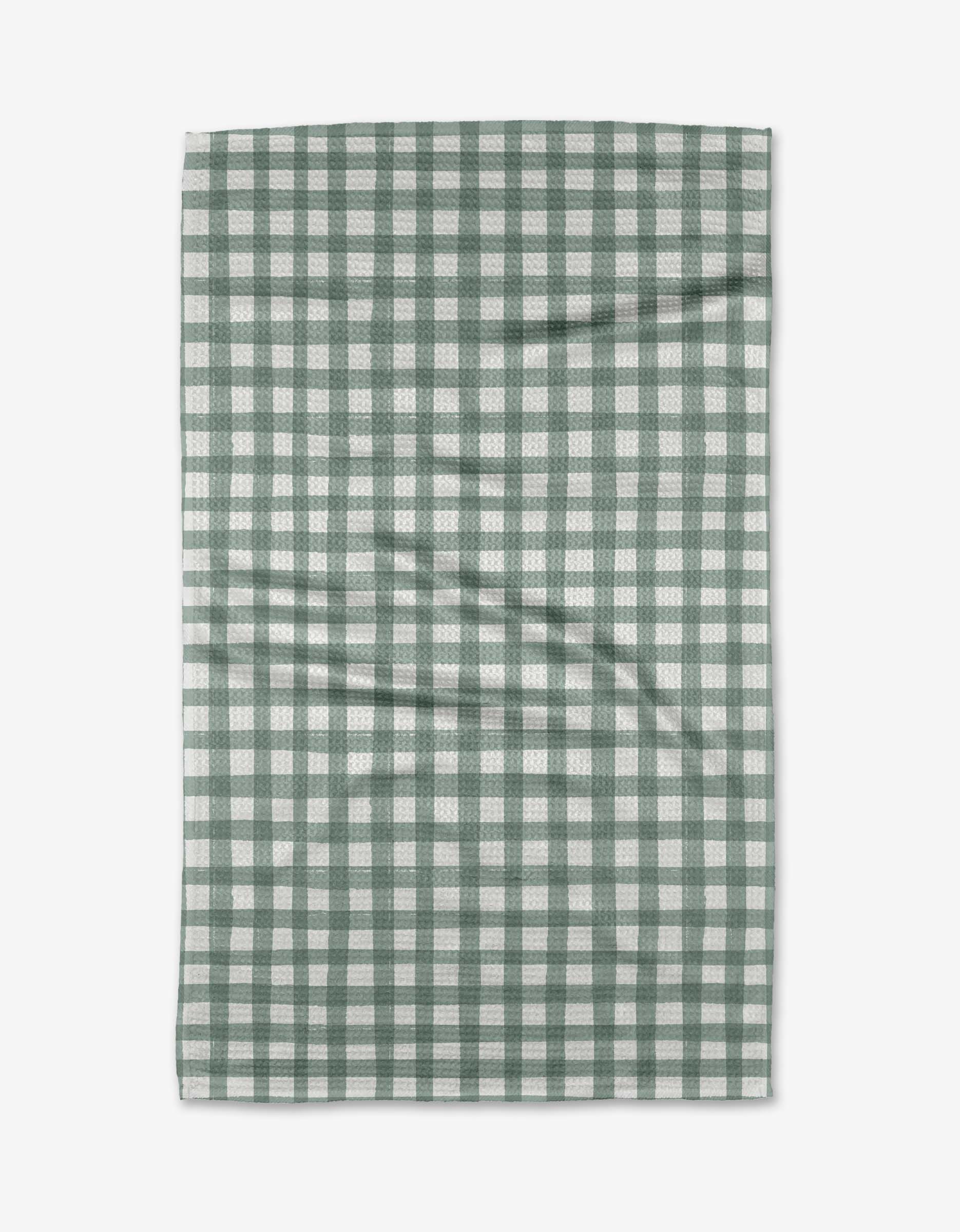 Picnic Gingham Tea Towel by Geometry. Tea Towel has a light green and white gingham pattern.