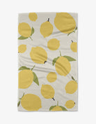 Sunny Lemons Tea Towel by Geometry. Tea Towel has lemons on a white background.